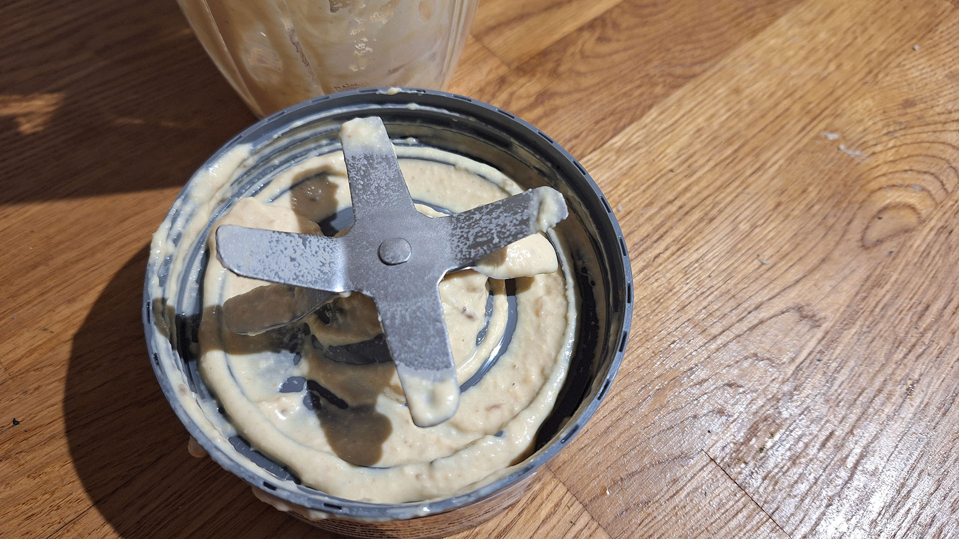 Hummus stuck in the blades of the Nutribullet 600 Series in the reviewer's kitchen