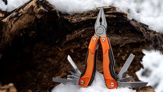 reasons you need a multitool: multitool and snow