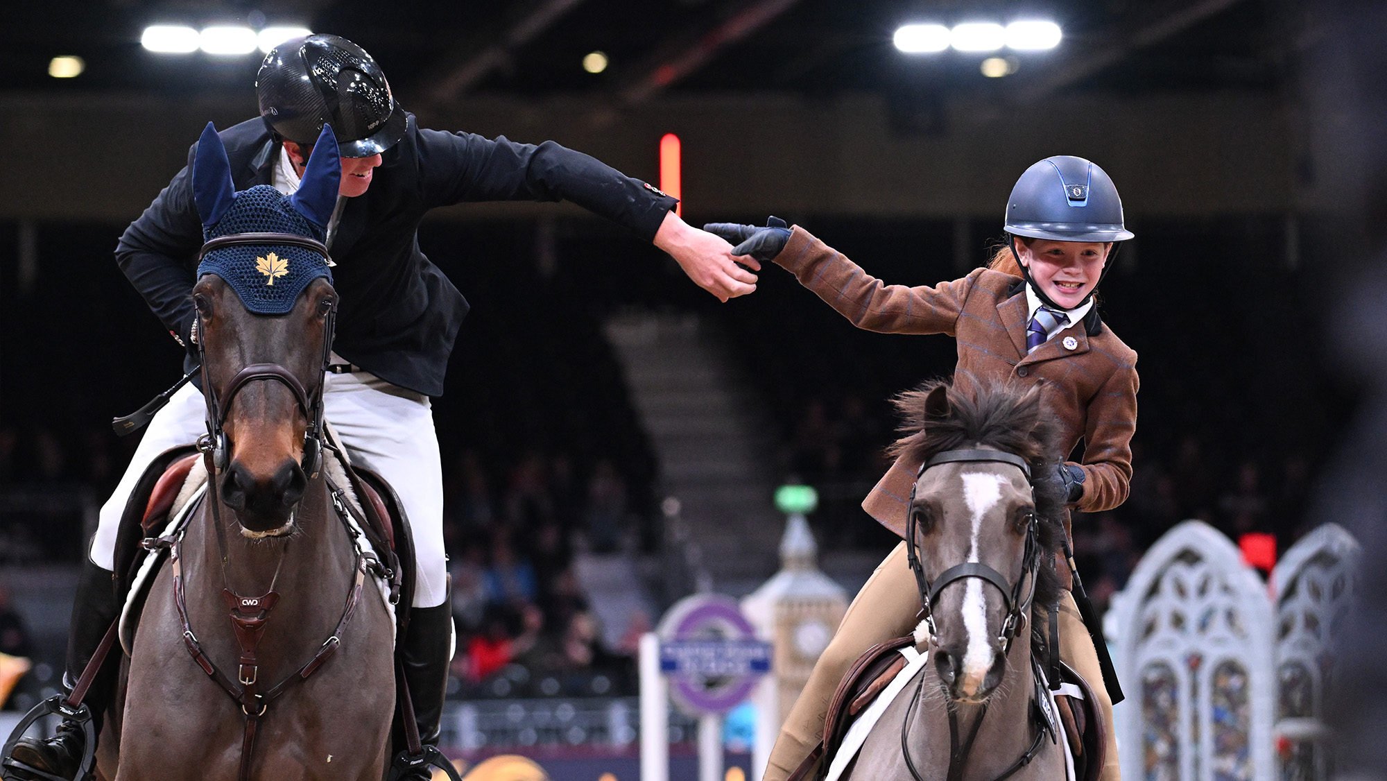 Matthew Sampson tags in Lilly McBride for her part in the mini-major relay at London International