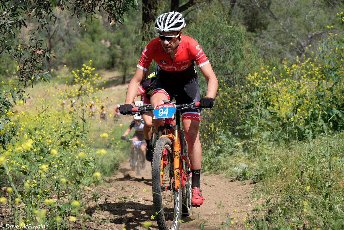 Sergio Mantecon Gutierrez (Trek) climbing out of the valley on the backside of the course
