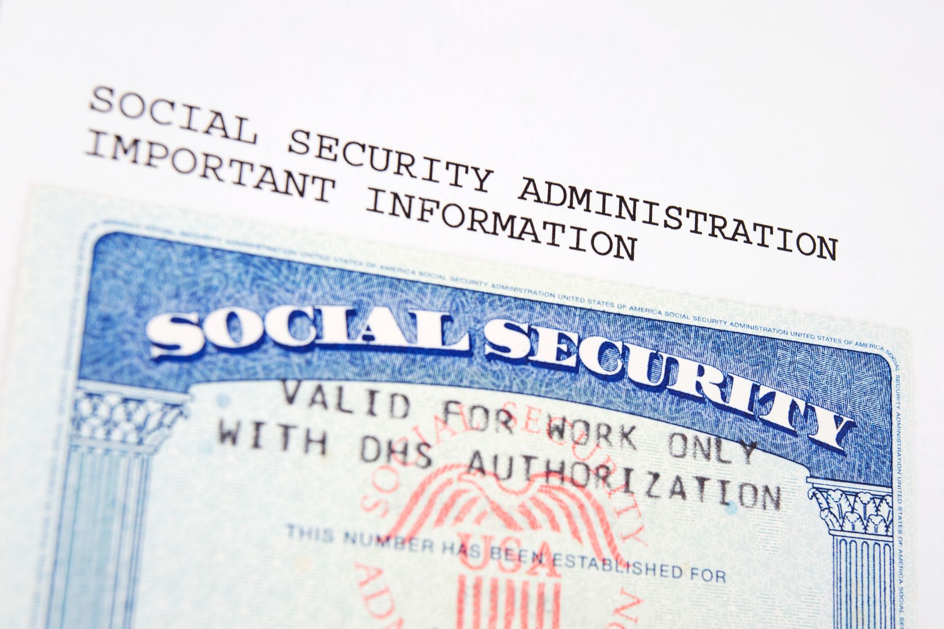 Close up of Social Security card with number blanked out.