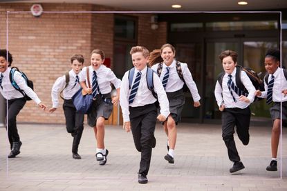 Children running out of school on the last day of term