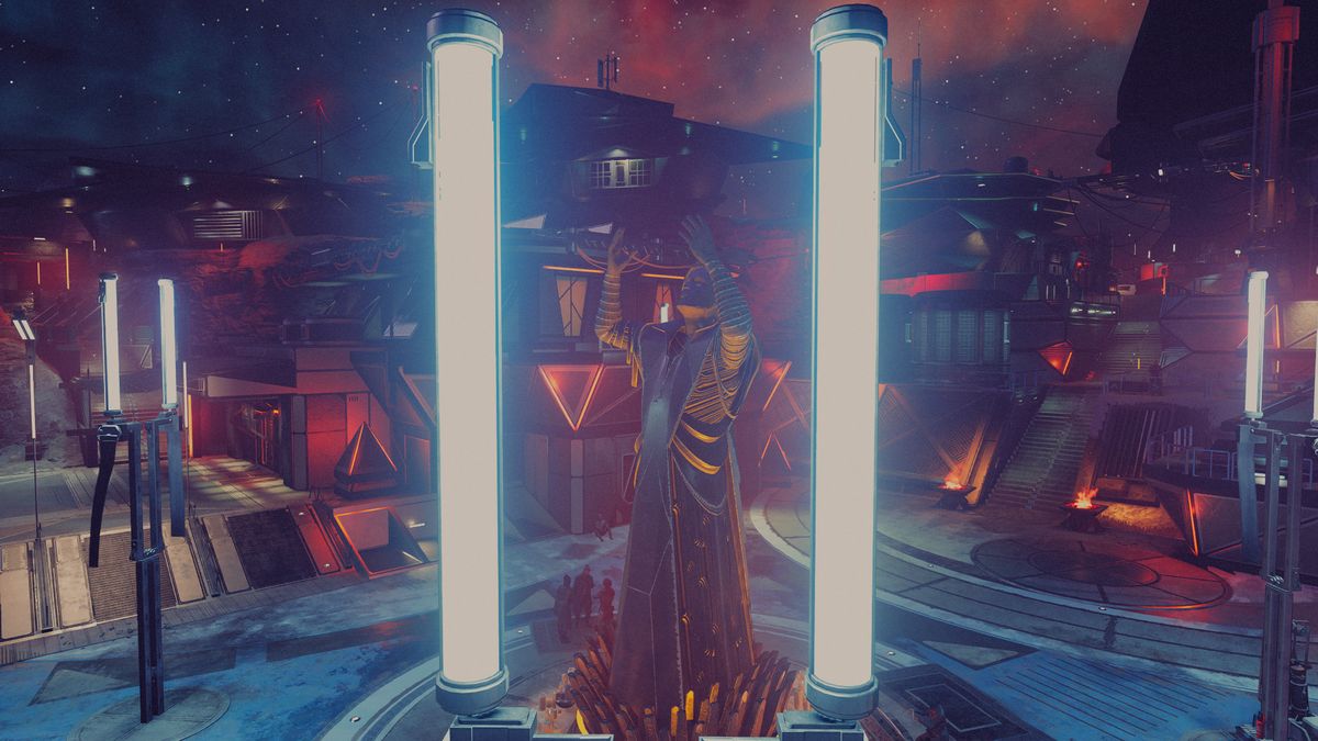 A statue next to some sci-fi lamps