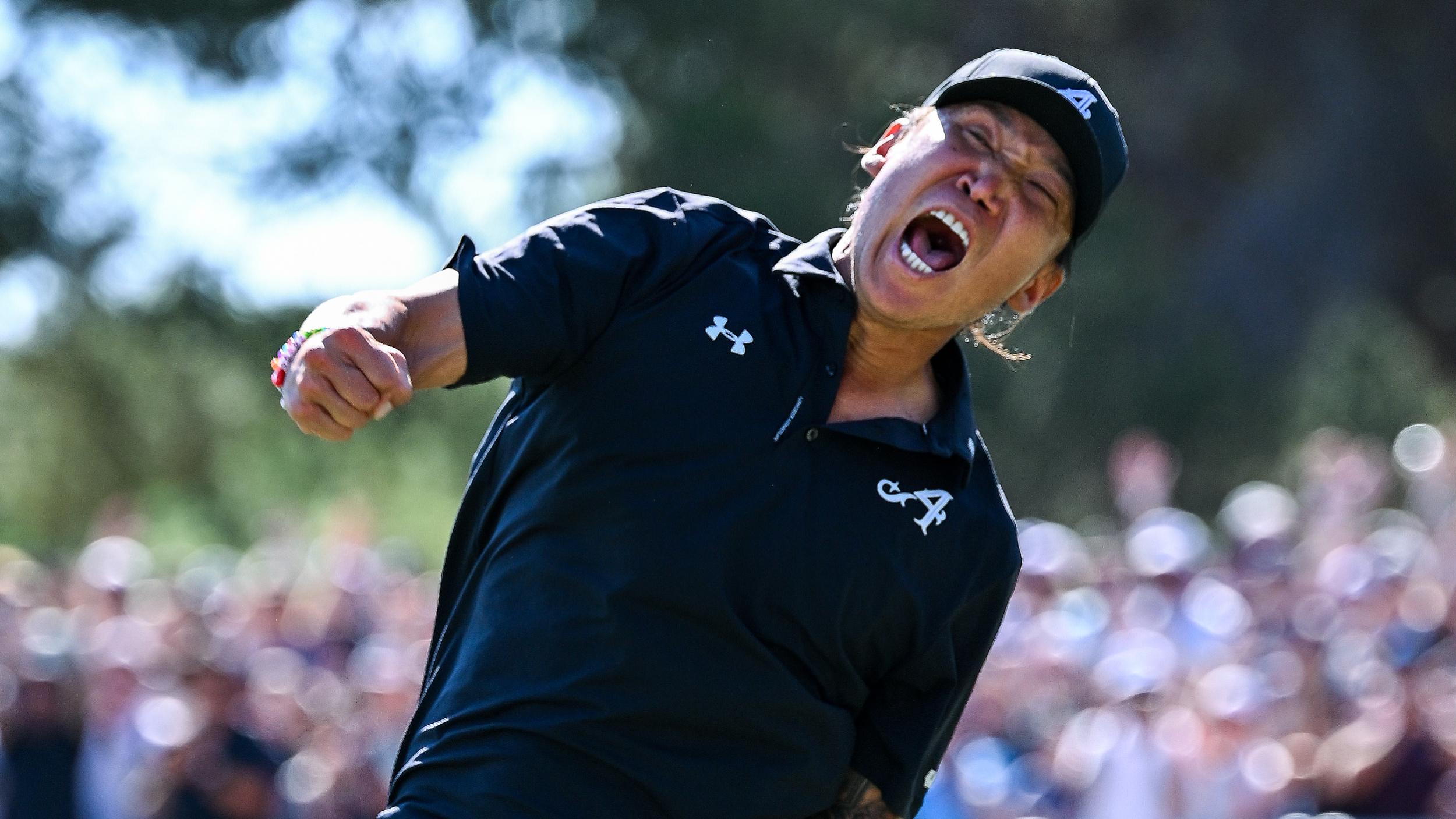 Anthony Kim punches the air after winning LIV Golf Adelaide 