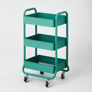 Green rolling cart with three shelves