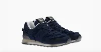 574 denim sneakers, $695 | New Balance x Miu Miu