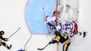 Igor Shesterkin #31 of the New York Rangers makes a save against Bryan Rust #17 of the Pittsburgh Penguins in Game Four of the First Round of the 2022 Stanley Cup Playoffs at PPG PAINTS Arena on May 9, 2022 in Pittsburgh, Pennsylvania.