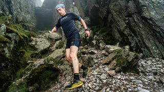 John Kelly running in the Peak District