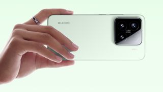 Xiaomi 15 held in a hand