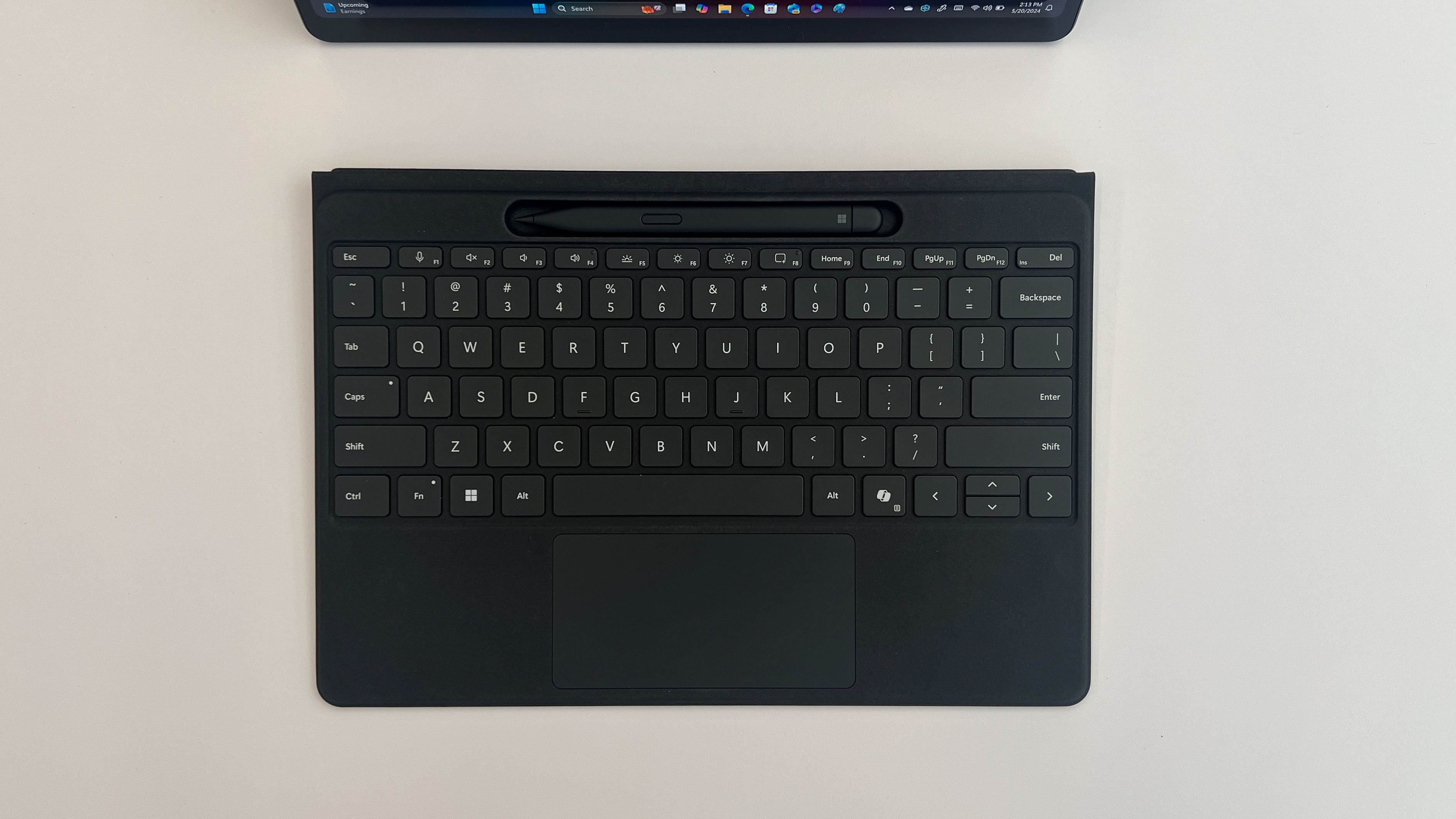 The Microsoft Surface Pro Smart Pen docked in the Flex Keyboard