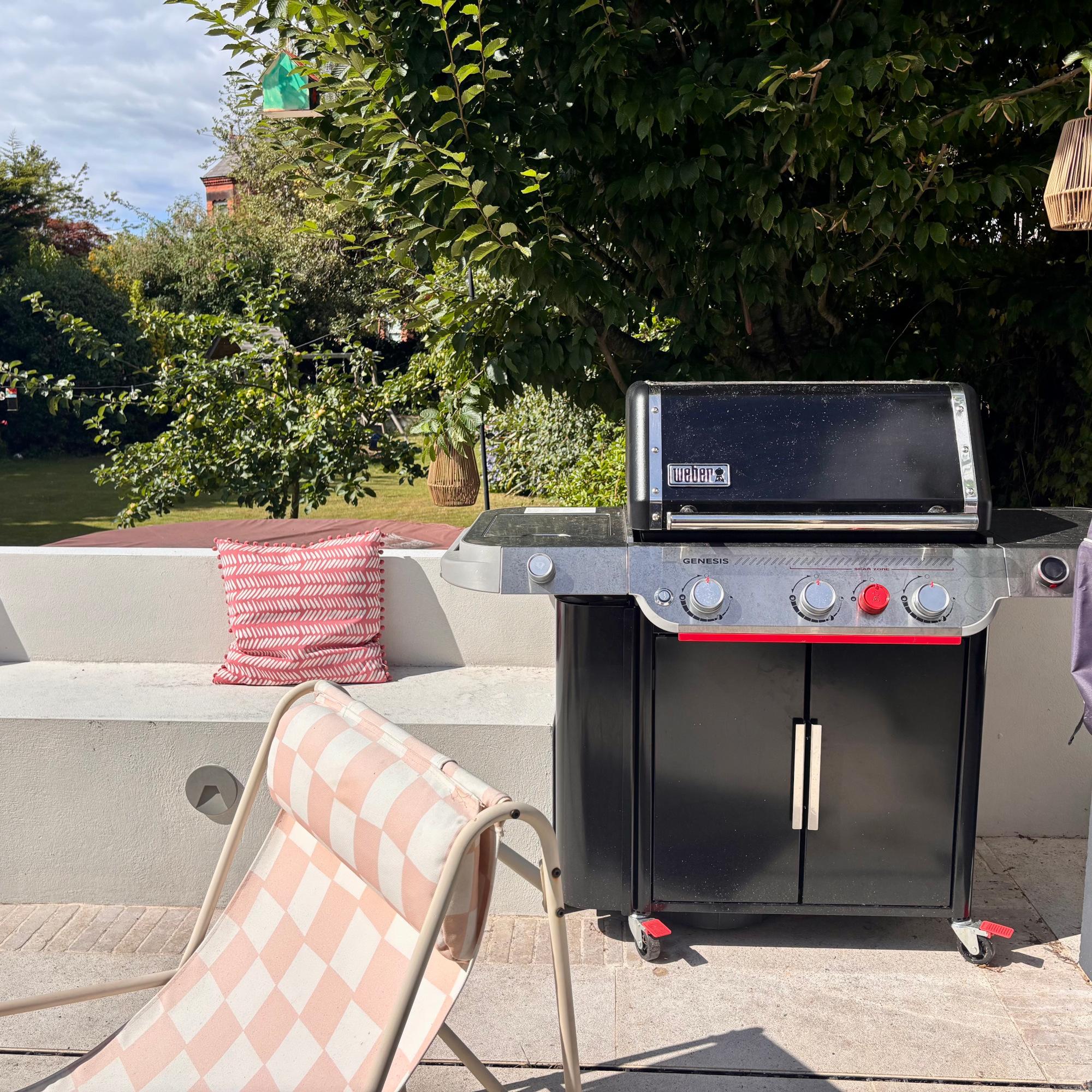Weber genesis epx-335 gas bbq on a patio