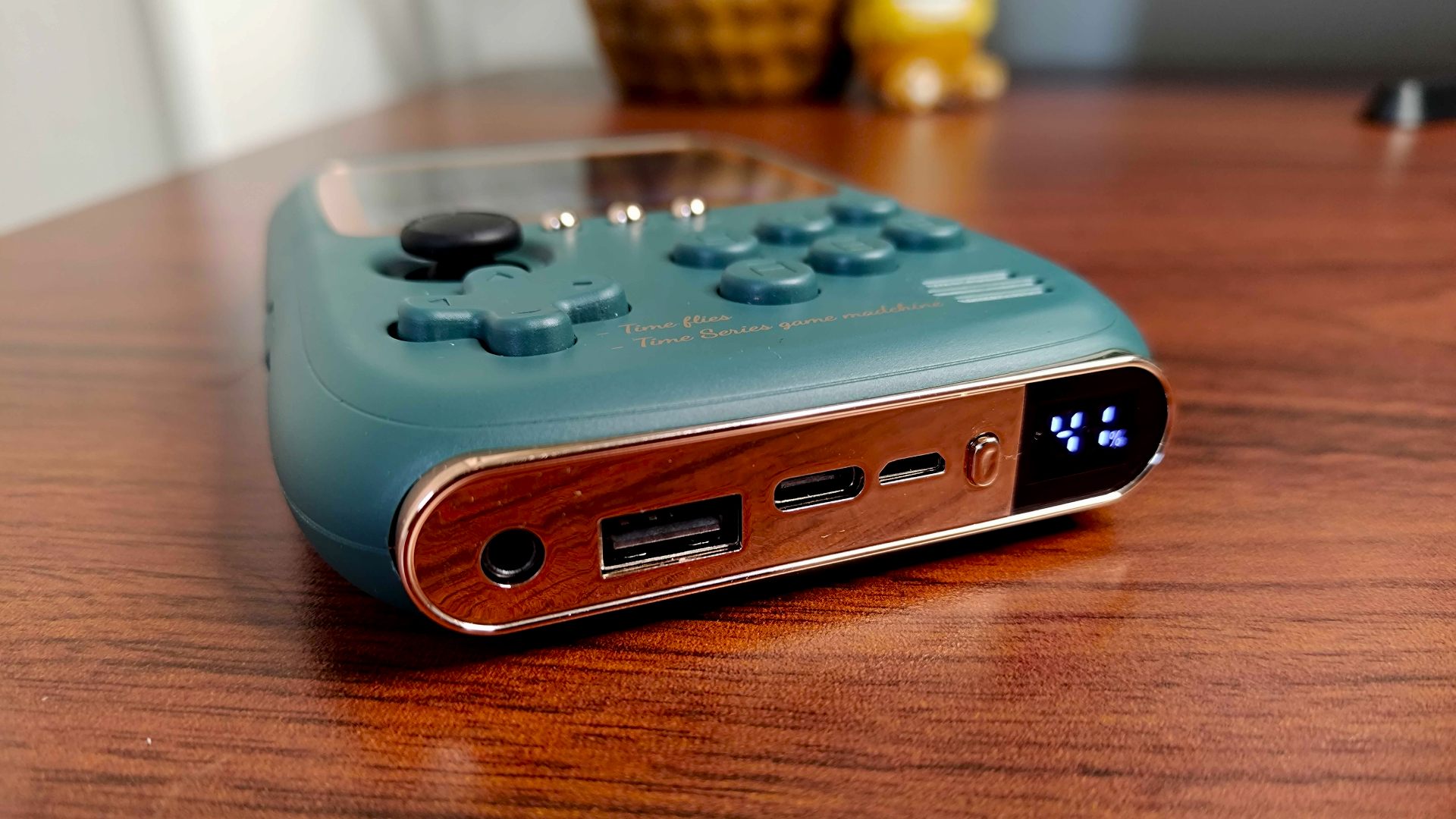 DY19 retro handheld with USB-C and Lightning cables at each side
