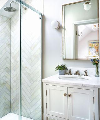 Tile shower, white sink