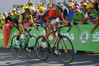 Vincenzo Nibali leads Primoz Roglic to the line