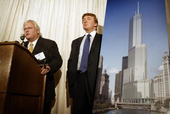 Donald Trump beside an artists rendition of Trump Tower Chicago.