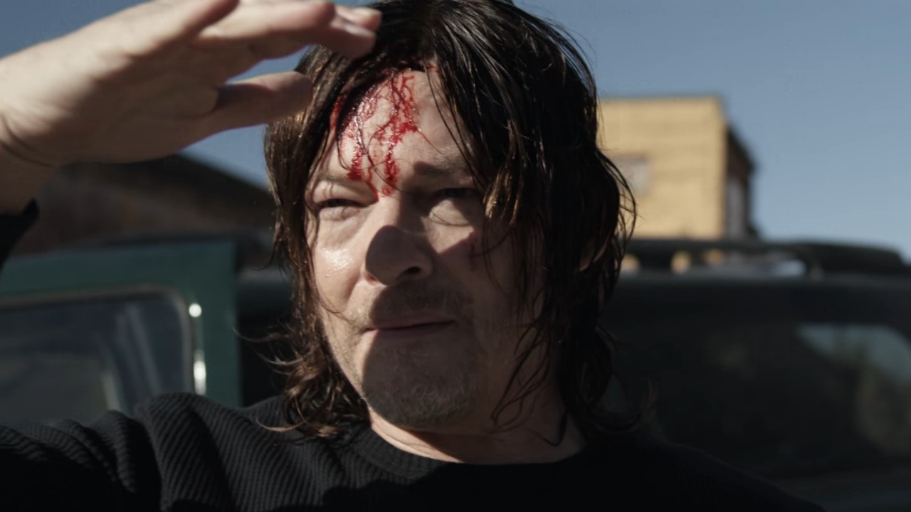 Daryl has blood on his forehead after a car accident in The Walking Dead