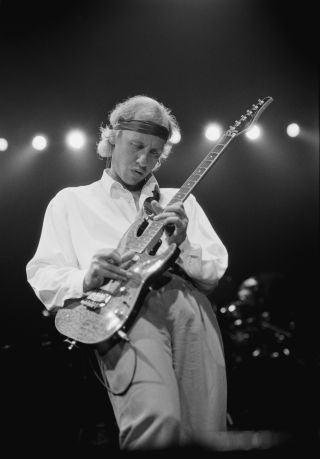 Mark Knopfler of rock band Dire Straits performs on stage at Wembley Arena, London, UK, 16th September 1991.