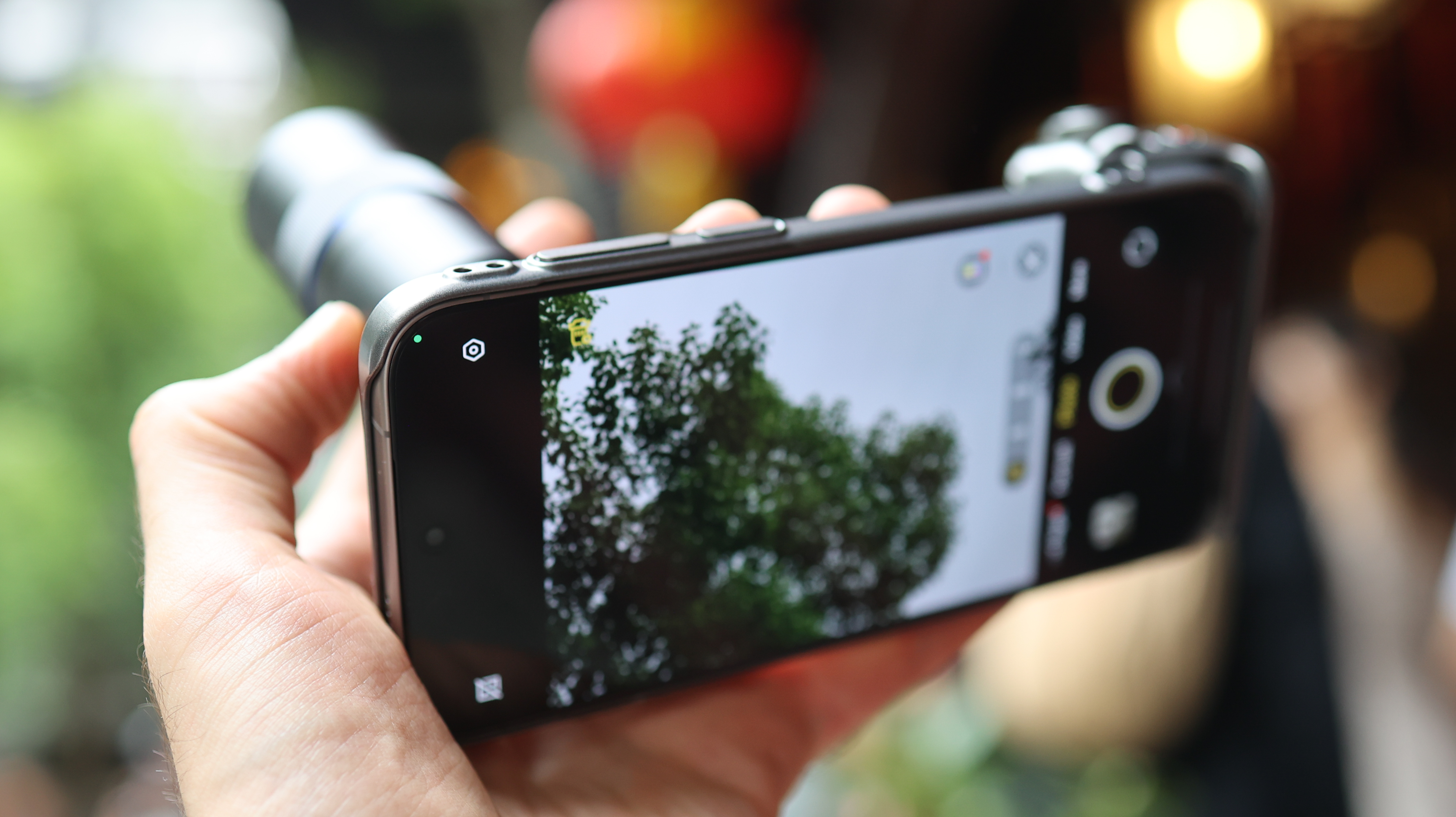 Vivo X300 Pro camera phone held in a hand
