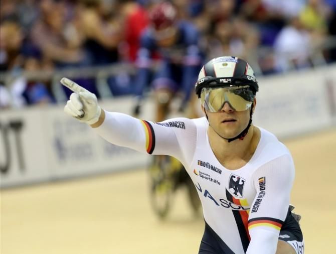 Robert Foerstemann (Germany) celebrates his sprint victory over Kevin Sireau (France).