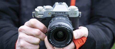 Fujifilm X-T50 camera in the hand with 16-50mm lens attached