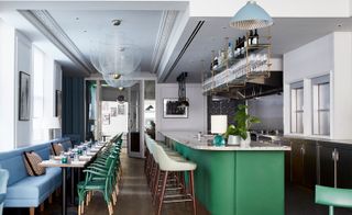 Allbright on Maddox Street features bright green accents to a design by Suzy Hoodless