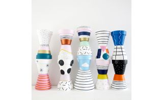 Holder's online shop mixes Sol LeWitt-like handpainted terracotta pots