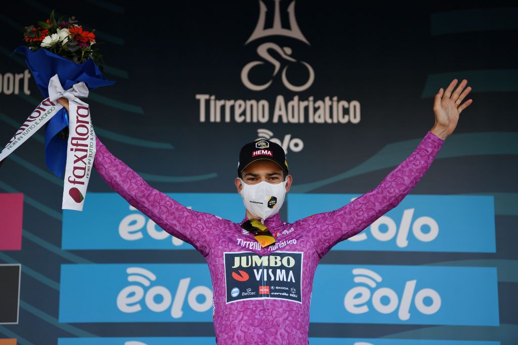 LIDODIFERMO ITALY MARCH 15 Podium Wout Van Aert of Belgium and Team Jumbo Visma Purple Sprint Jersey Celebration during the 56th TirrenoAdriatico 2021 Stage 6 a 169km stage from Castelraimondo to Lido di Fermo Mask Covid safety measures Flowers TirrenoAdriatico on March 15 2021 in Lido di Fermo Italy Photo by Tim de WaeleGetty Images