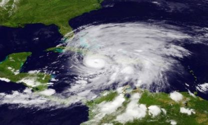 Hurricane Sandy left 21 people dead in the Caribbean before it began making its way to the northeastern United States.
