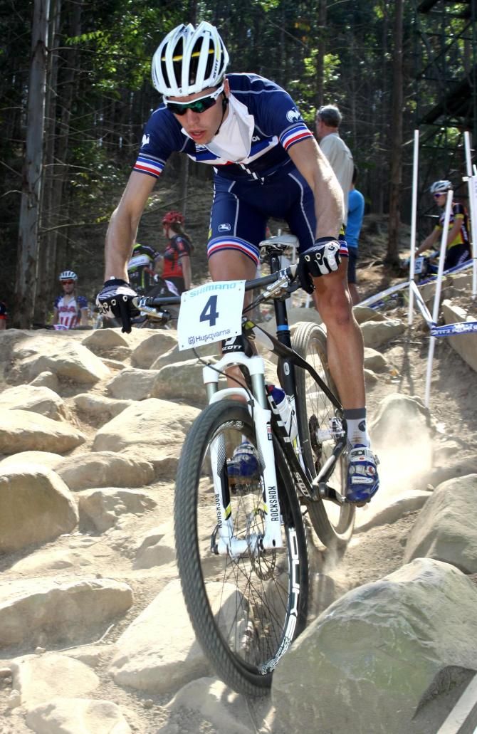 France's Raphael Gay heads down the widened Rapid Rocks rock garden during training