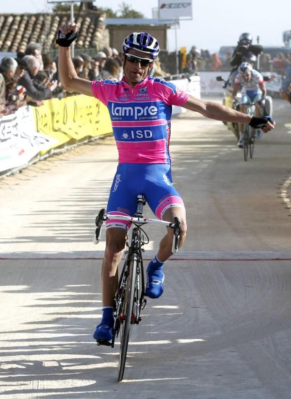Here Michele Scarponi (Lampre-ISD) lets himself go