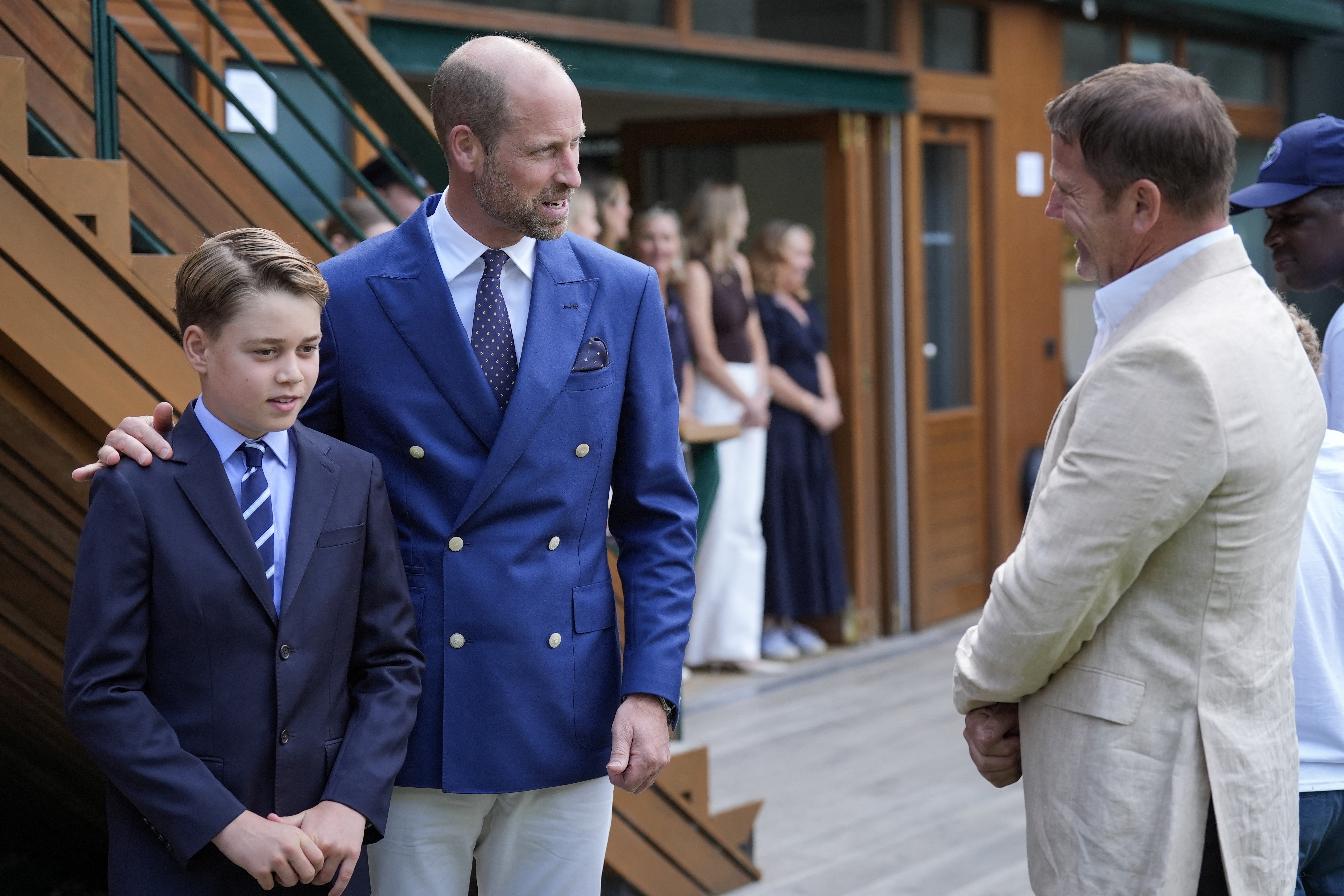 Prince William wearing crisp white Wimbledon pants