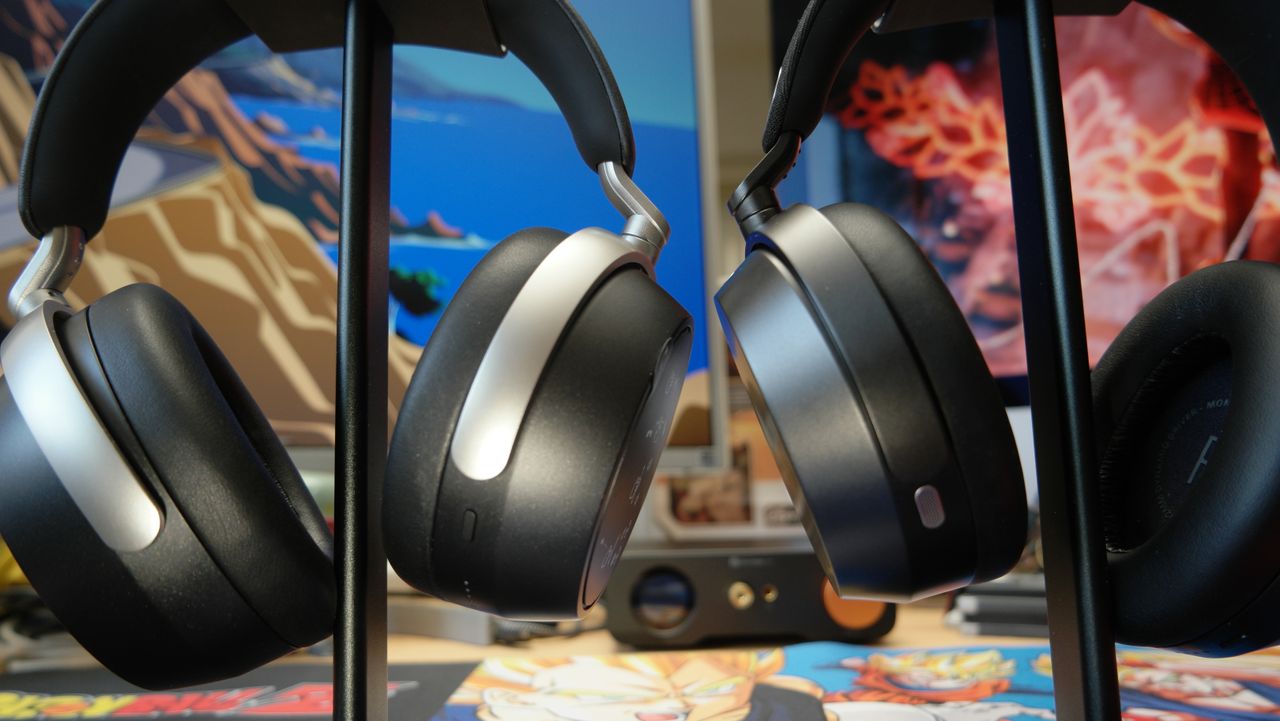 Sennheiser Momentum 5 headphones on a desk next to the HDB 630 on the left