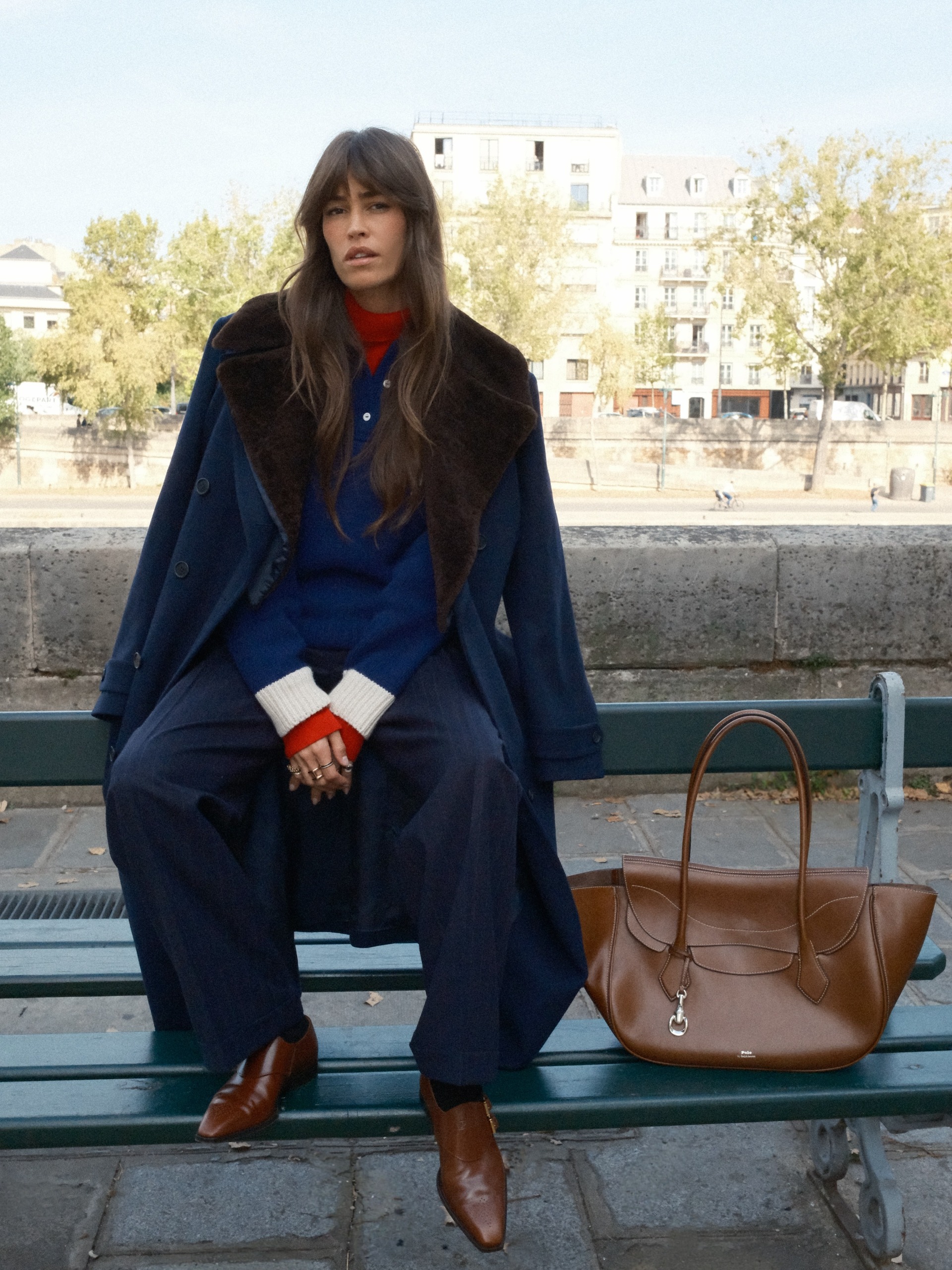Woman in cognac leather accessories.