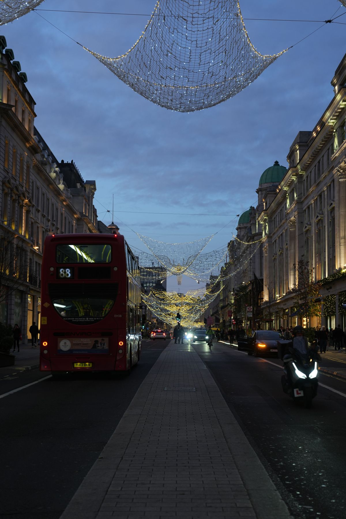 View down Regents Street in London with Christmas hanging above the road