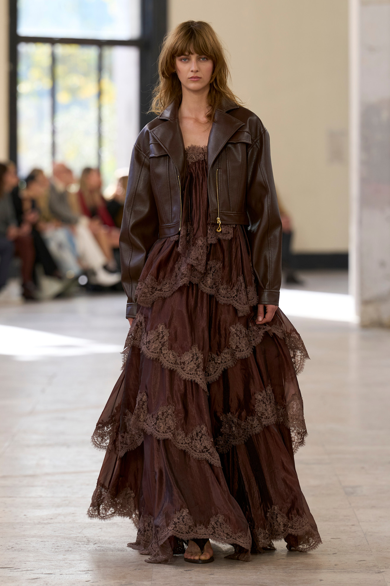 A model wore heeled flip-flops on the Aje Spring 2026 runway