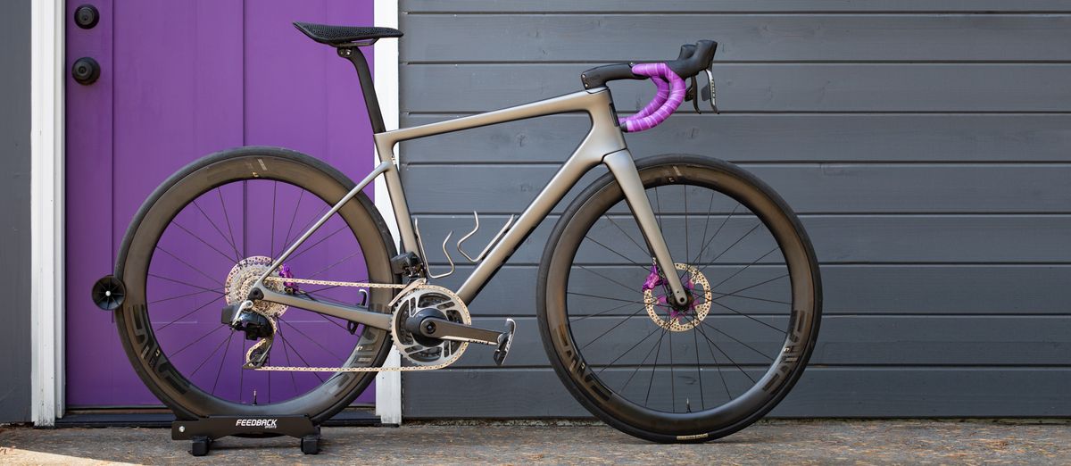 Enve Melee in front of purple door header version