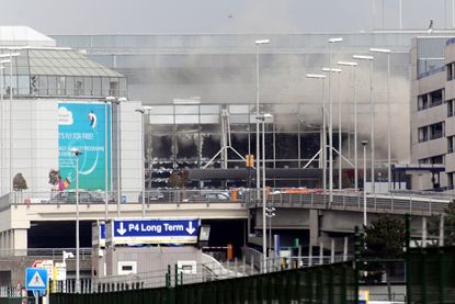 Smoke rises from Brussels Airport after March 22 terrorist attack