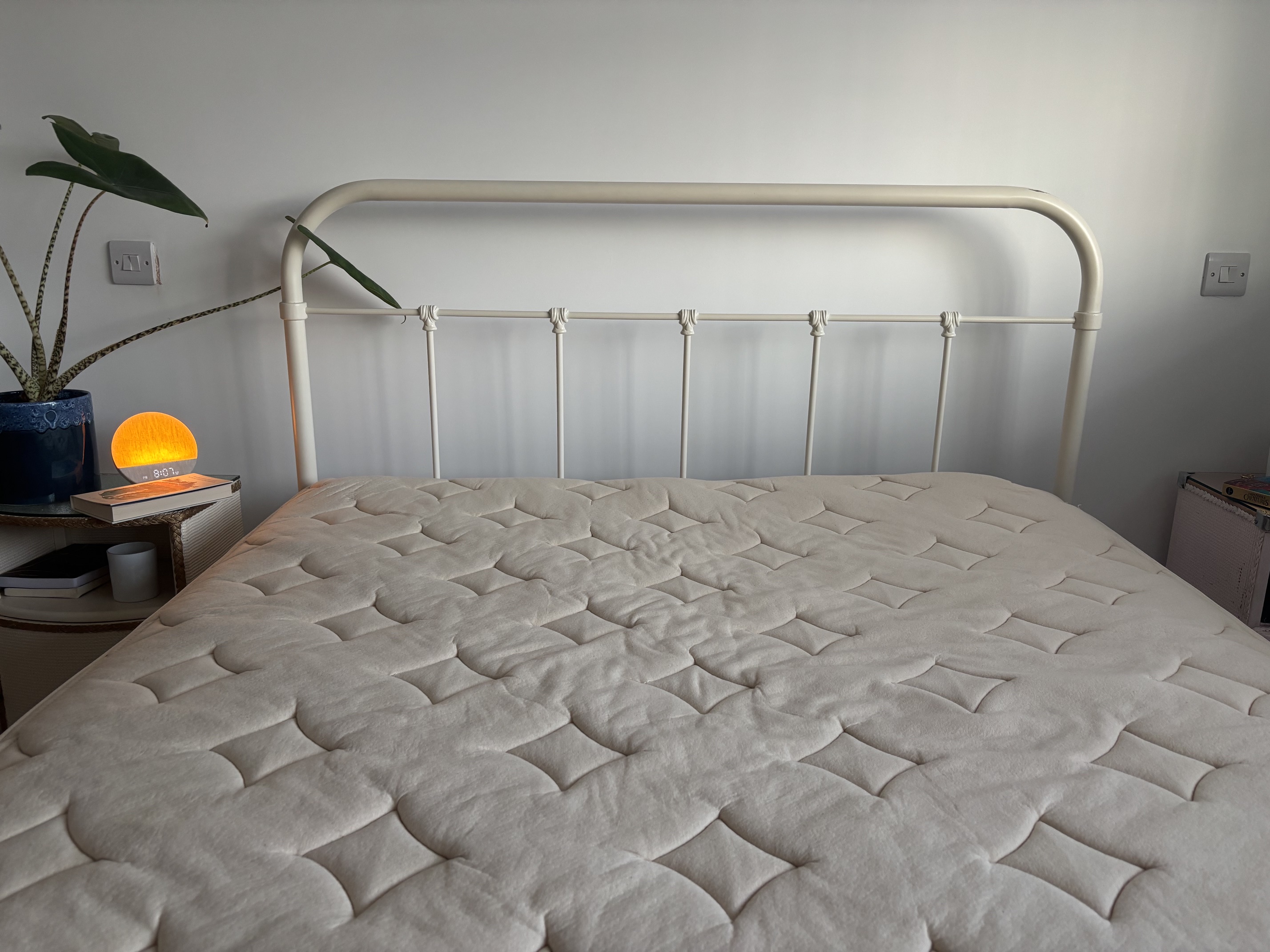 The image shows the beige Birch Elite Mattress in our mattress reviewer's home during the testing process