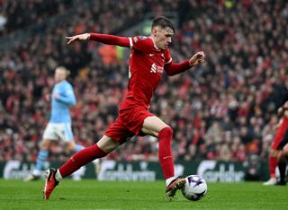 Liverpool's Conor Bradley on the ball against Manchester City in March 2024.