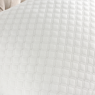 white pillows with geometric pattern