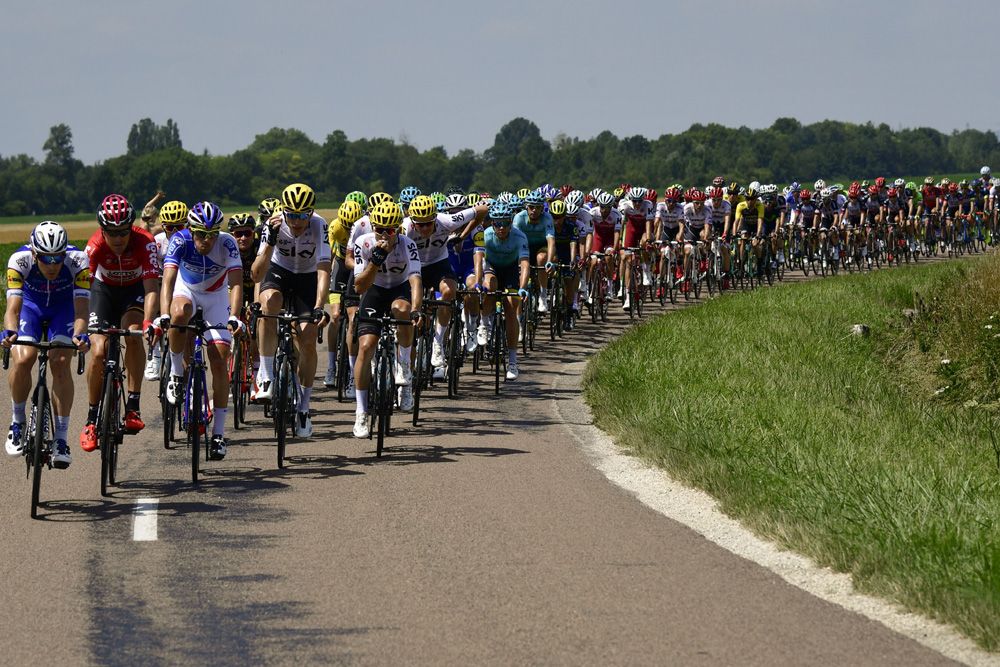 The Tour de France peloton suffers in the sun