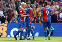 Will Hughes of Crystal Palace celebrates with teammate Joel Ward after scoring the team's first goal during the Premier League match between Crystal Palace and Nottingham Forest at Selhurst Park on May 28, 2023 in London, England. (Photo by Tom Dulat/Getty Images)