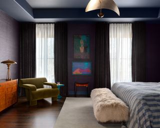 color drenched bedroom with grasscloth wallpaper