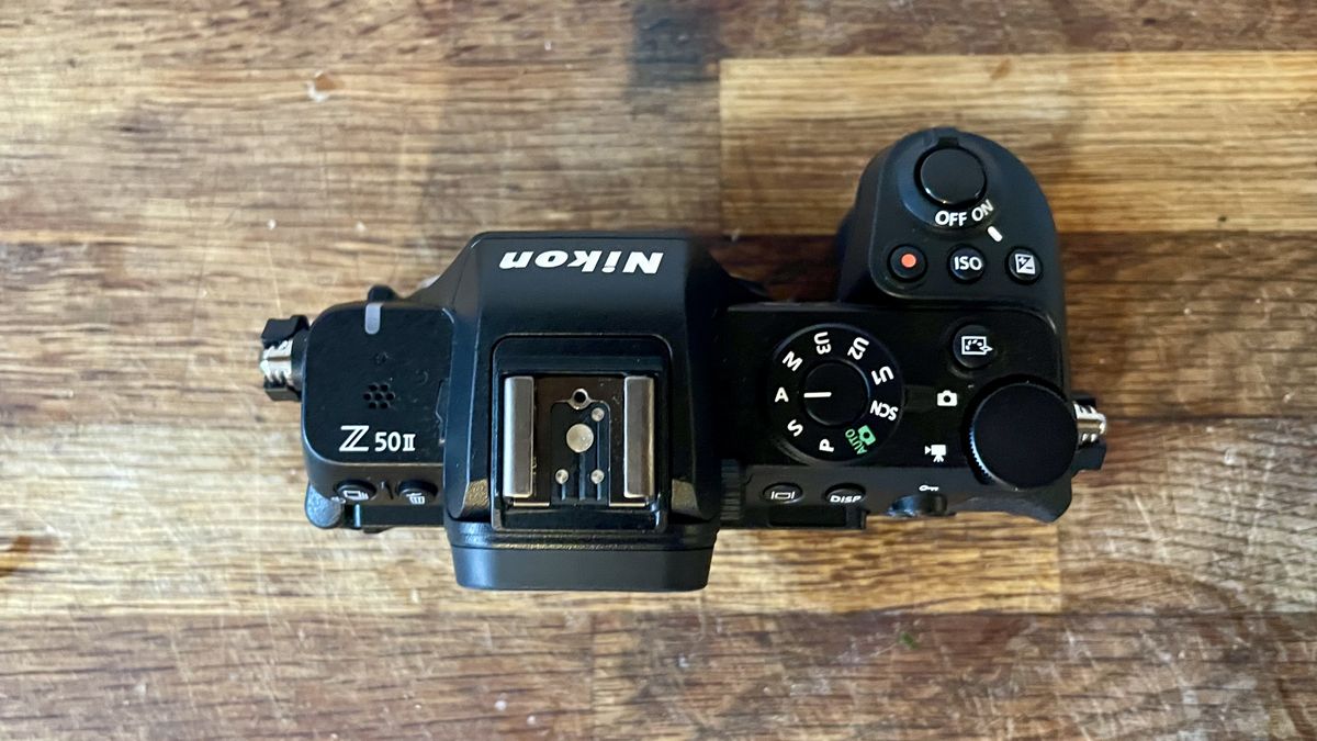 Nikon Z50 II mirrorless camera on a wooden tabletop