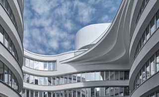 Balconies on the exterior of The Fontenay hotel with the sky behind the building.