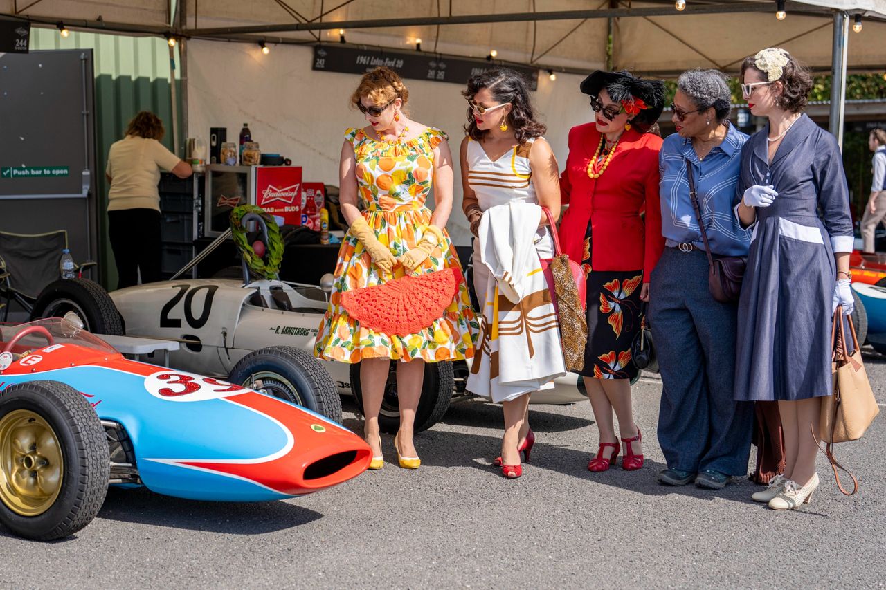 Images from the Revival. Fast cars, people in vintage dress, everyone having a nice time.