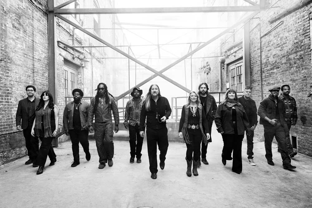 Tedeschi Trucks Band walking down an alley
