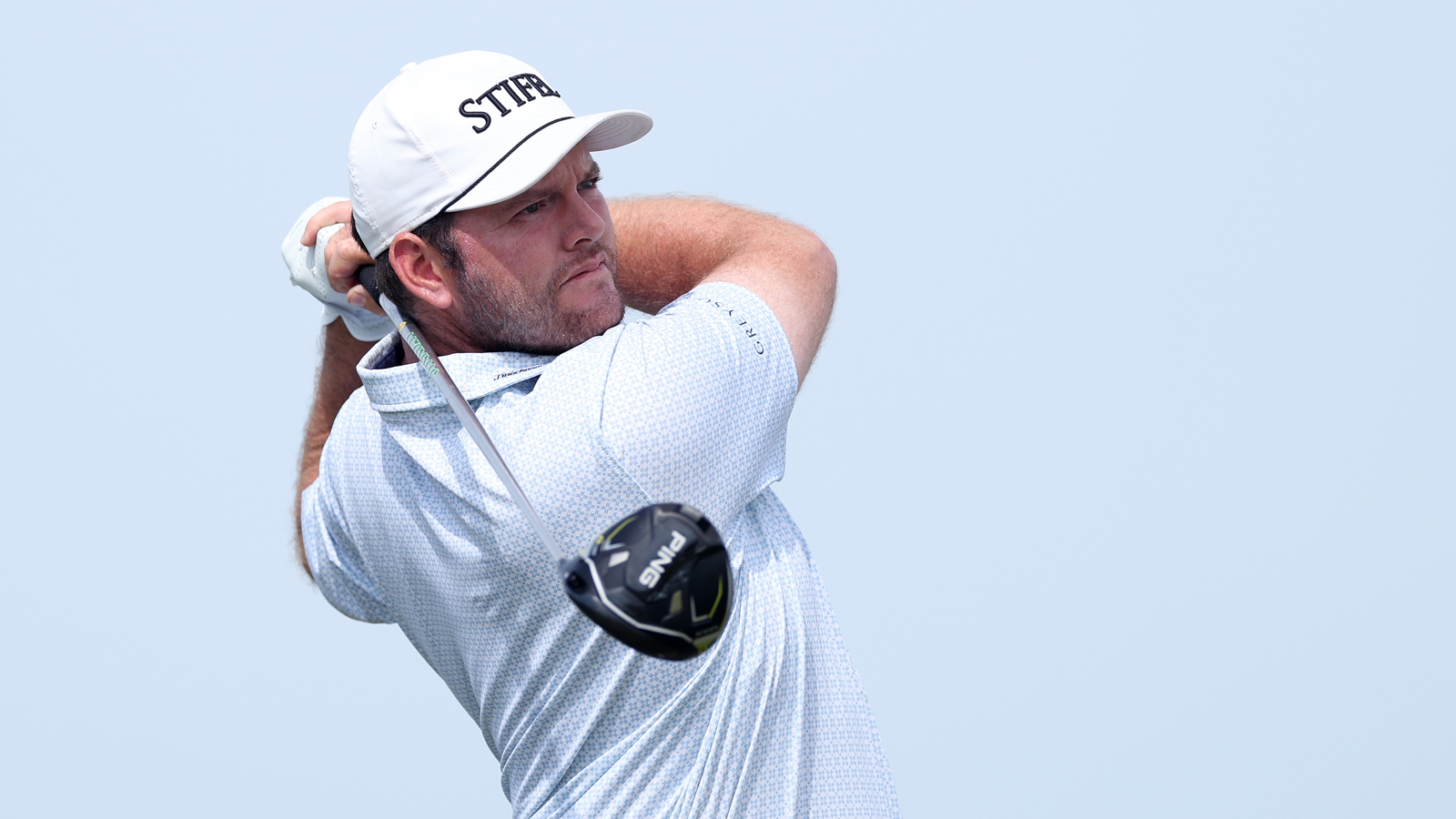 Harry Higgs hits a driver off the tee