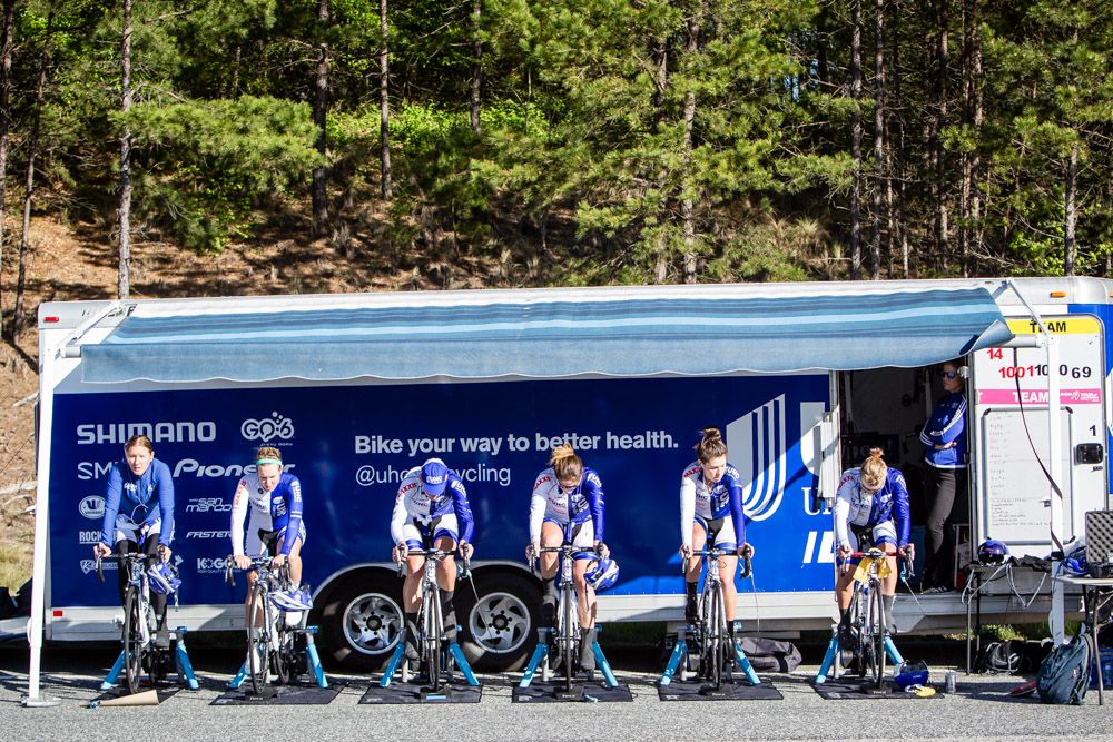 UnitedHealthcare women warm up in the chilly morning air.