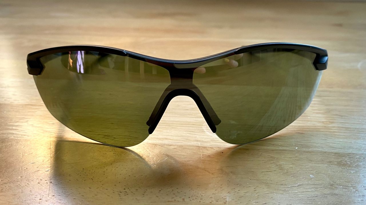 the Nike Victory Elite women's sunglasses laid on a table